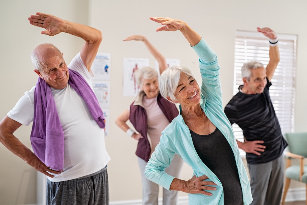 Seniors stretching during a workout class