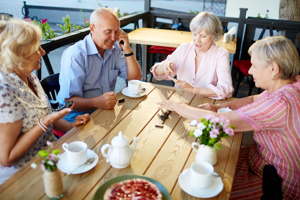 A group of residents. enjoy tea while at the senior independent living in Michigan