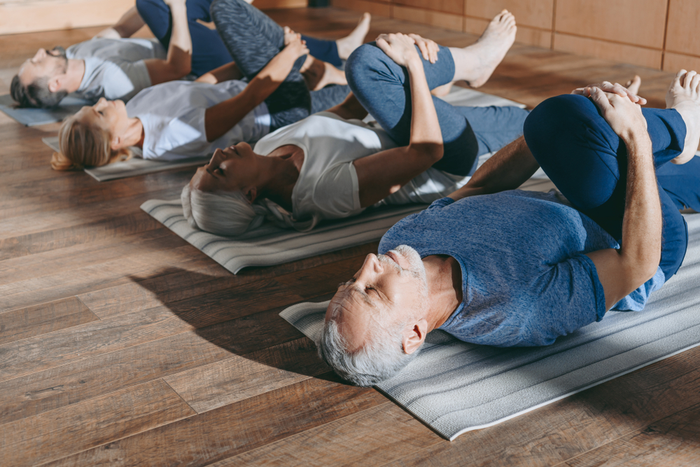 Group of seniors enjoying yoga at Reserve at Red Run