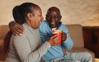 A senior couple enjoying coffee together at the Madison Heights senior apartments