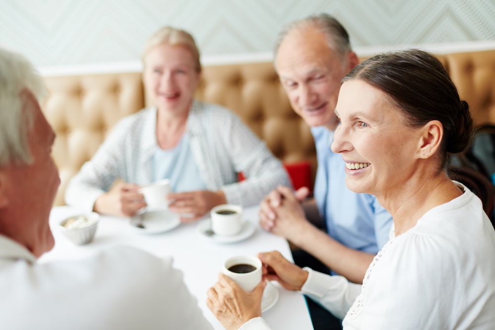 A group of seniors enjoying coffee together