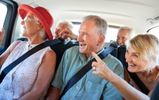 Seniors in van excited to explore the city of their senior living community madison heights
